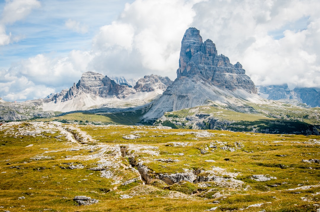 Magic landscape 😊 by Games Like rock formation on wide field grass under cloudy blue sky during daytime