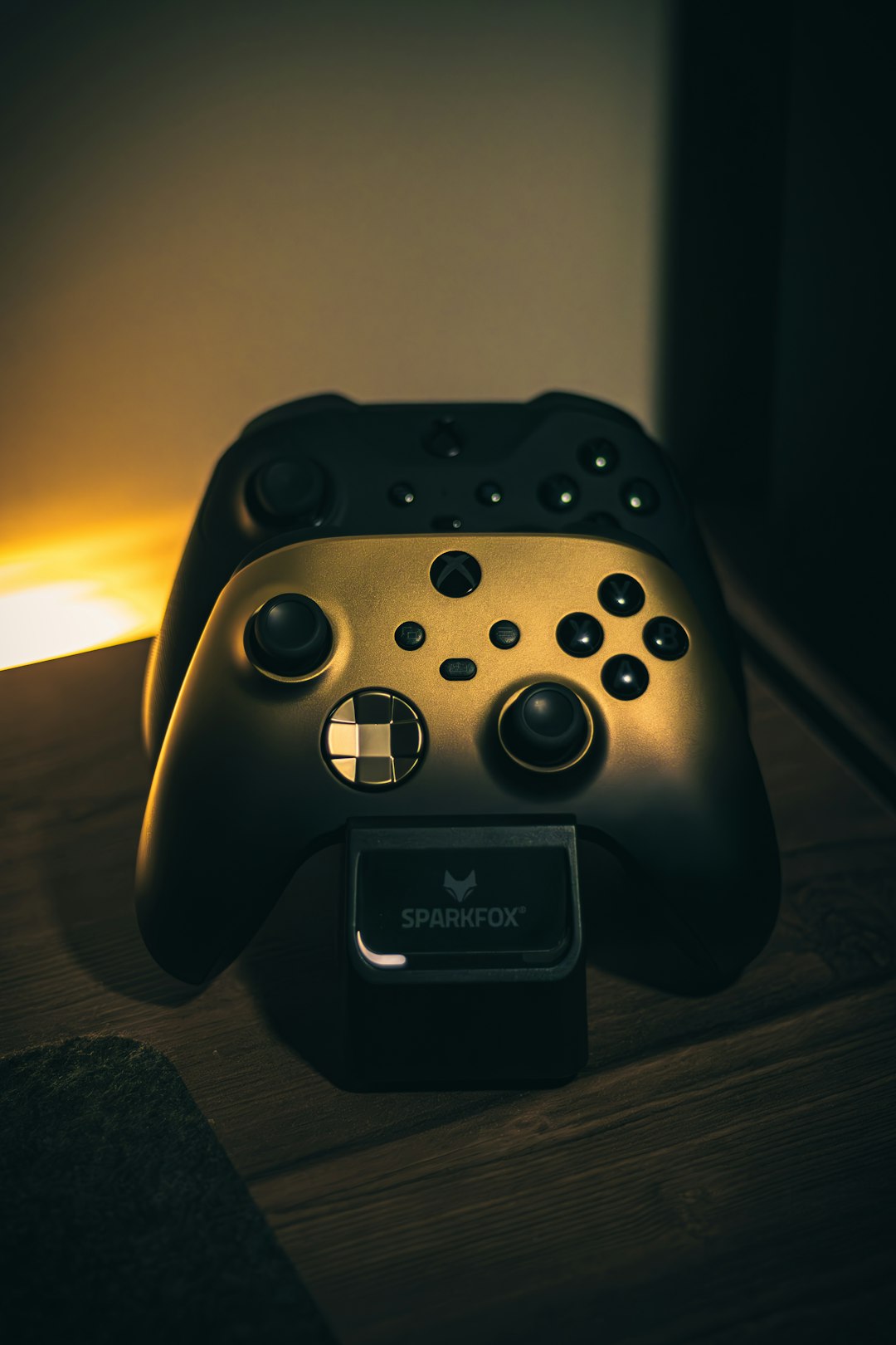 A close up of a controller on a table